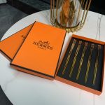 HermÃ¨s Gold Chopsticks