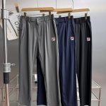 Fila Trousers Red Nylon Woven Fabric Soft And Smooth To The Touch Unrestricted Movement Quick-Drying Lightweight Outdoor Summer Embroidery Side Pockets