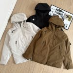 Descente Coat Brown Down Water-Repellent Fabric Clean Lines Urban Outdoor Sophistication Autumn Winter Crisp Silhouette
